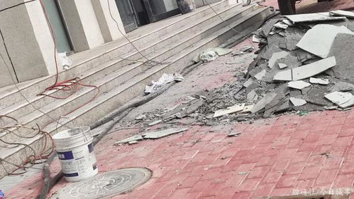 回迁新楼外墙脱落敲响安全警钟，高空坠物隐患不容忽视